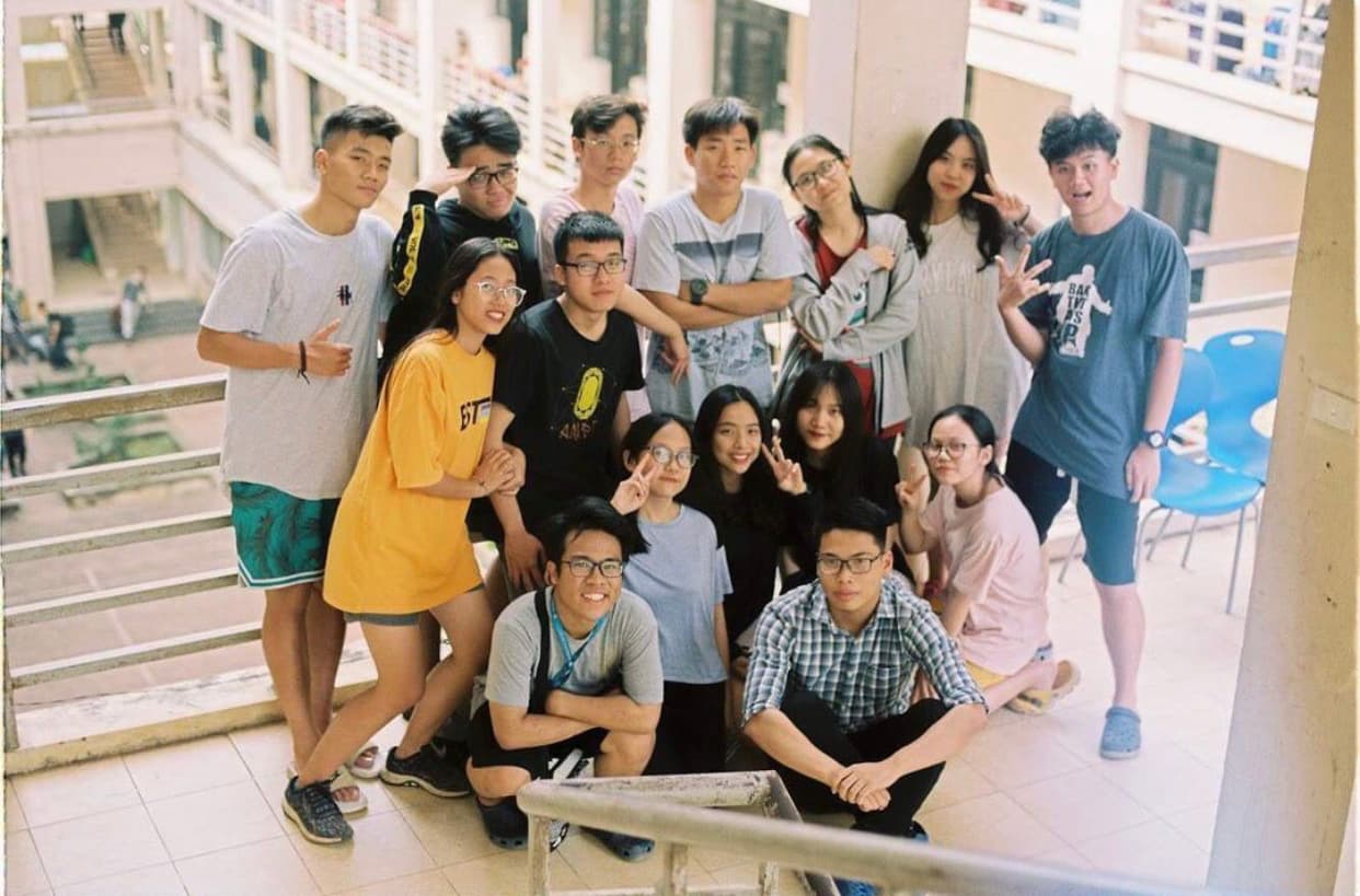 Linh's high school friend group posing during their annual week-long military training