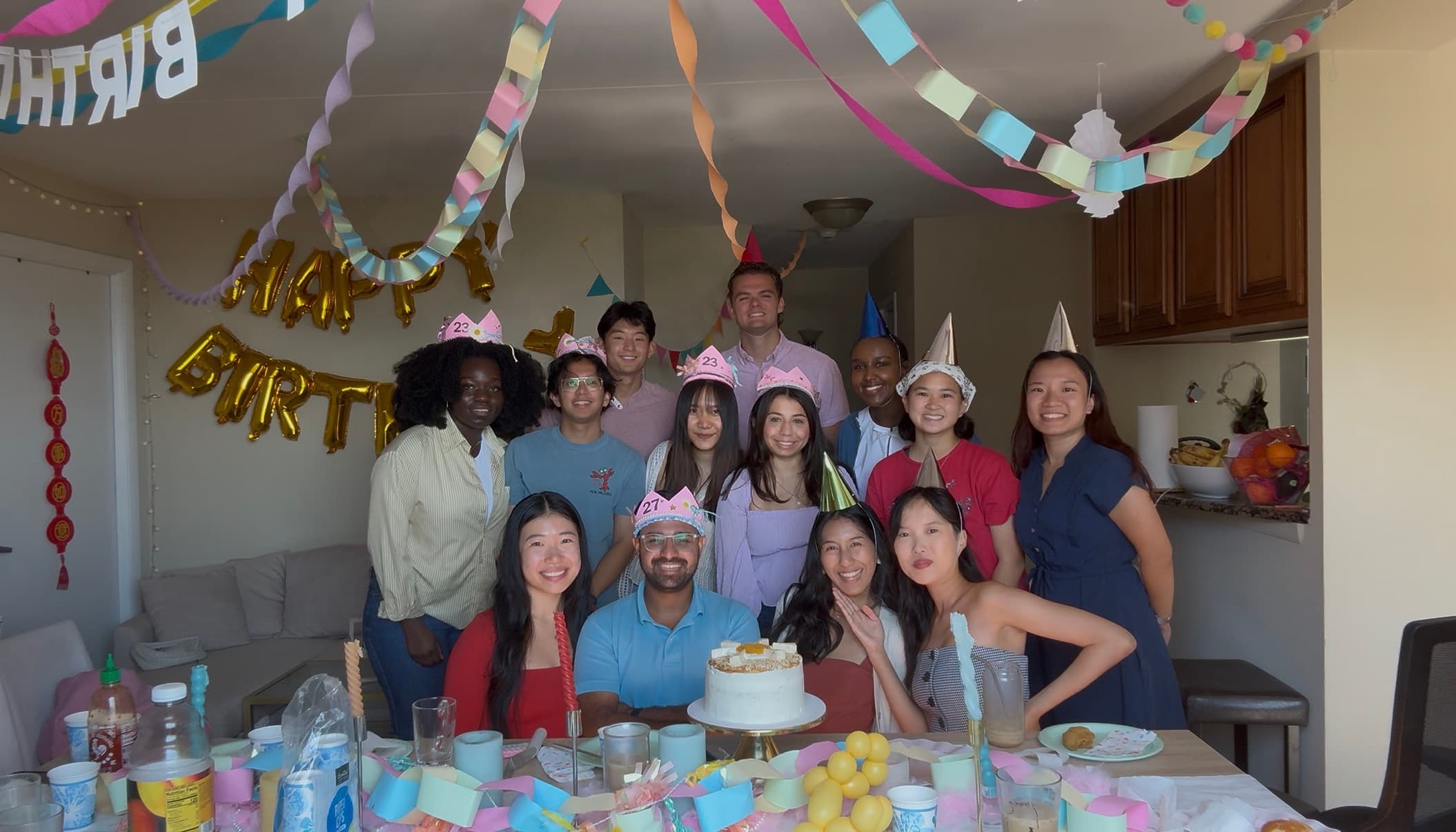 Friends around a birthday cake in Chicago